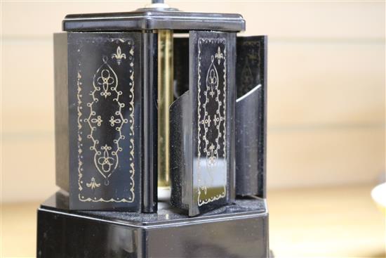 A bakelite musical cigarette dispenser and a similar Crown Derby pottery kennel, 21cm.